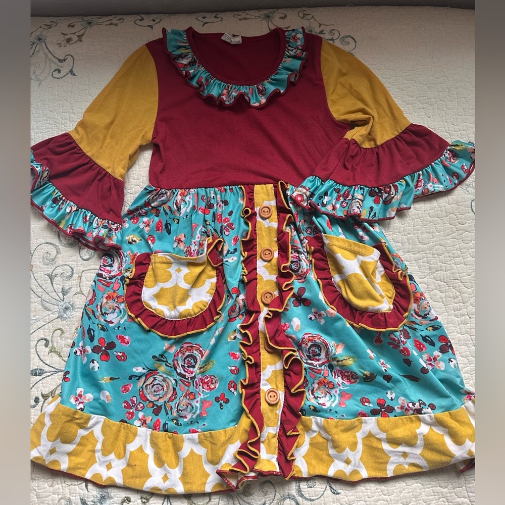 Unique dress by Tutu and Lulu. Size 6-7 girls. 95%cotton 5%spandex
